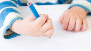 Signs Your Child May Struggle with Fine Motor Skills and Midline Crossing