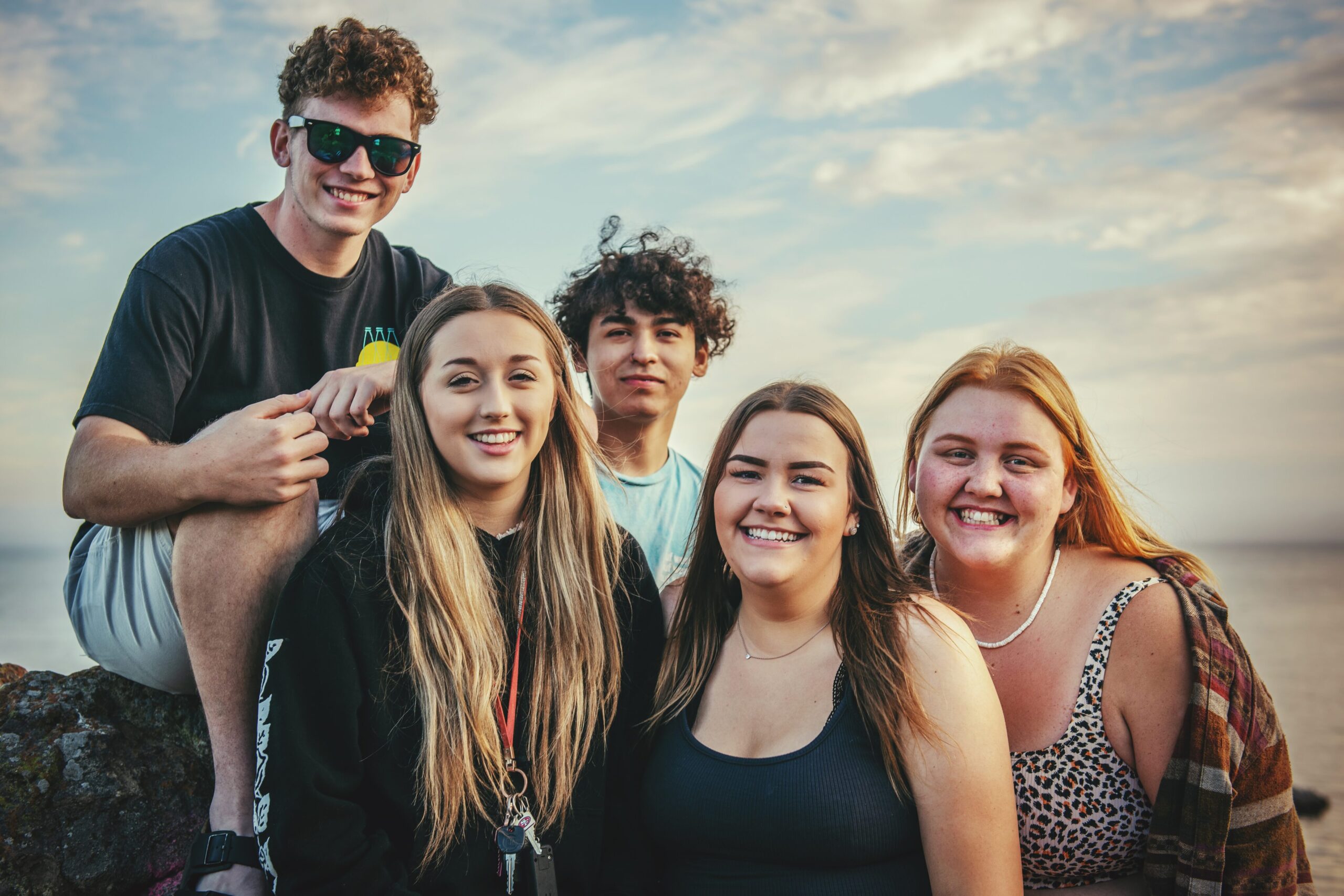 Tween standing arms-crossed, mortified during a 'babyish' party game