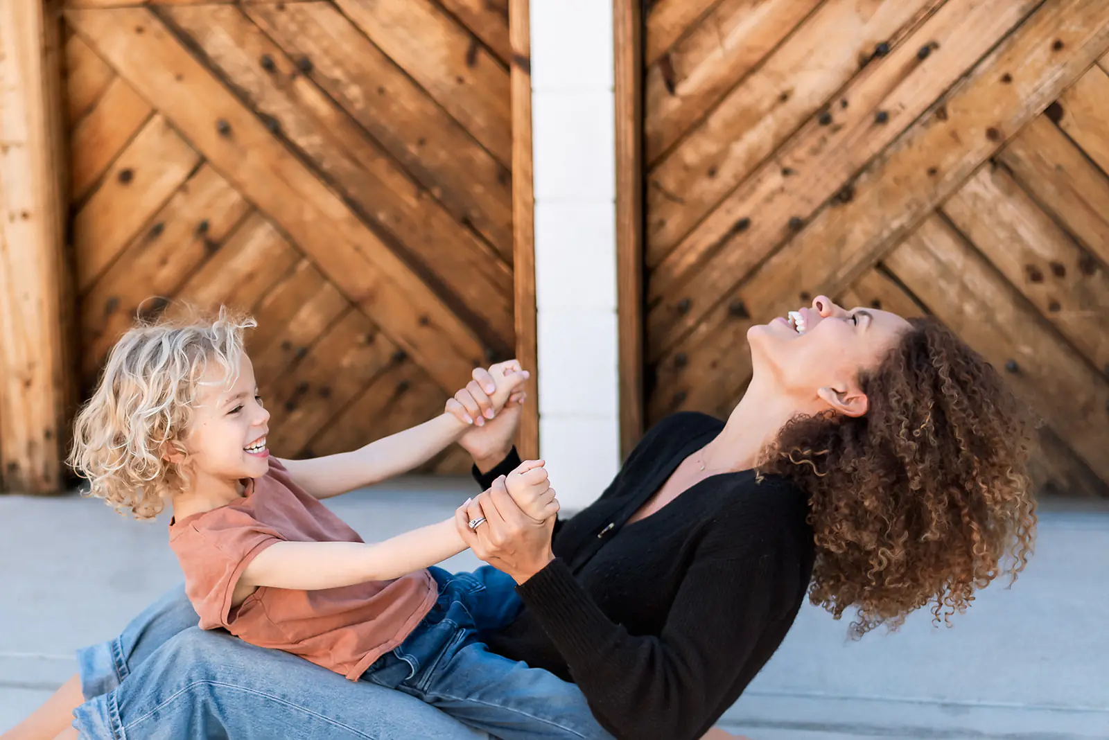Parent gently correcting child's behavior - shame vs guilt in parenting with grace