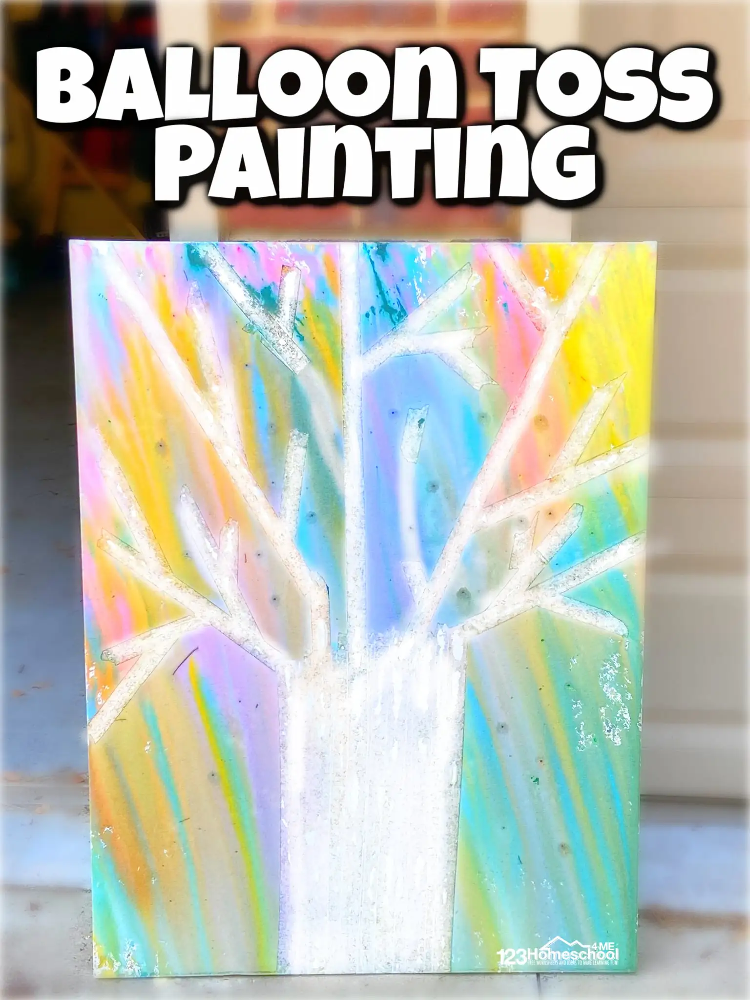 Kids throwing paint-filled balloons at poster board